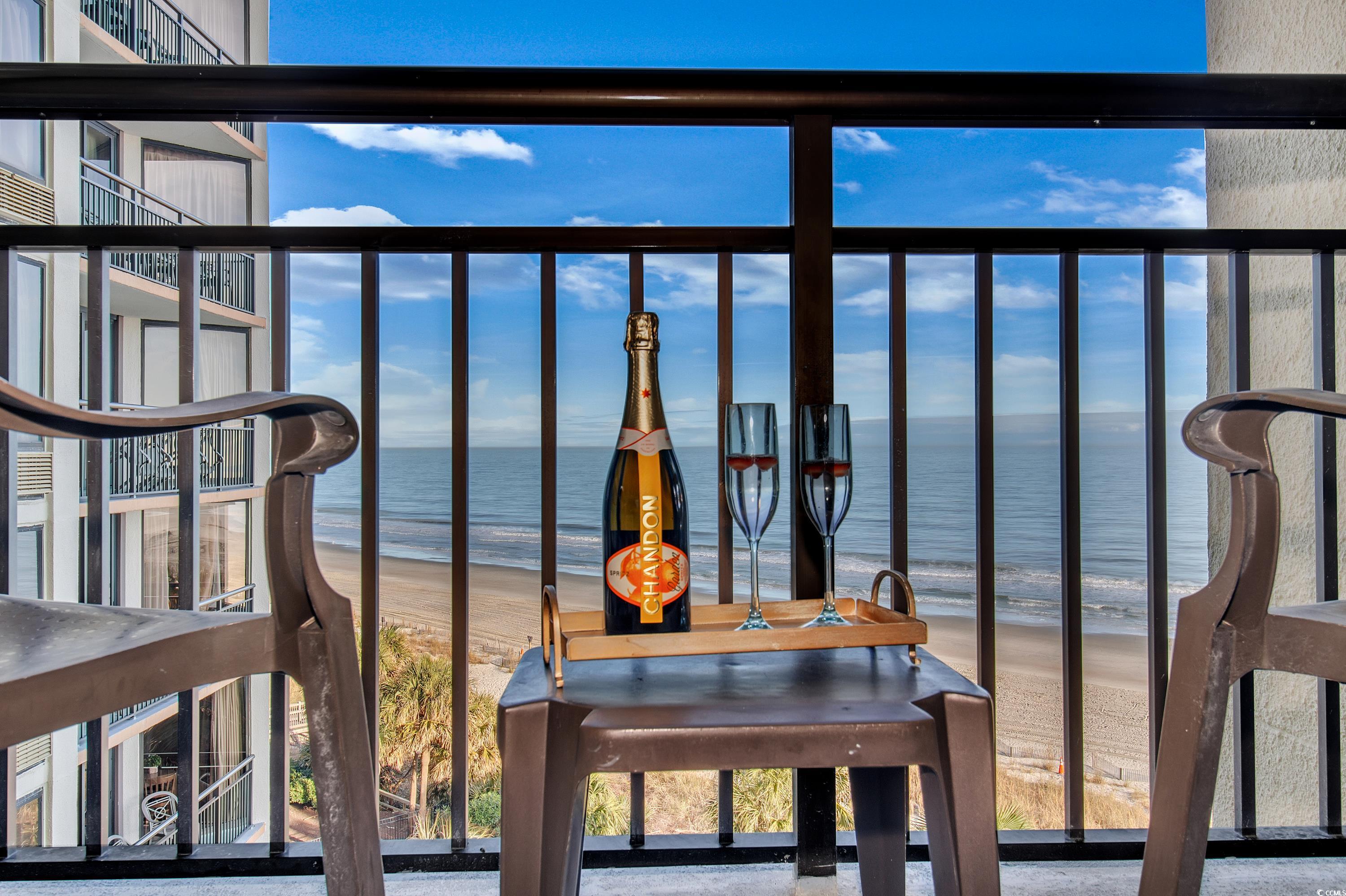 2710 North Ocean Boulevard, Unit 622 Myrtle Beach, SC 29577 - Photo 19 of 37 Balcony featuring view of water and beach