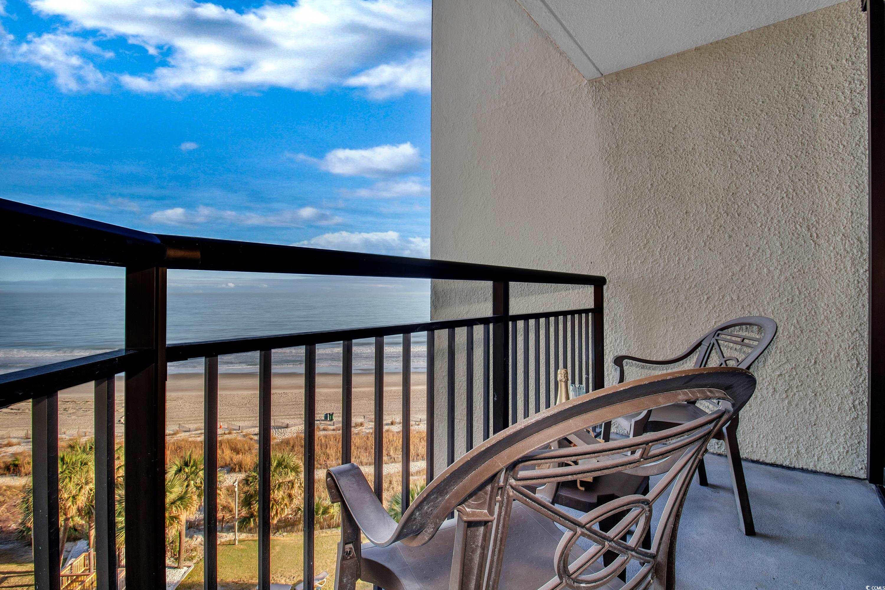 2710 North Ocean Boulevard, Unit 622 Myrtle Beach, SC 29577 - Photo 21 of 37 Balcony featuring view of water and beach