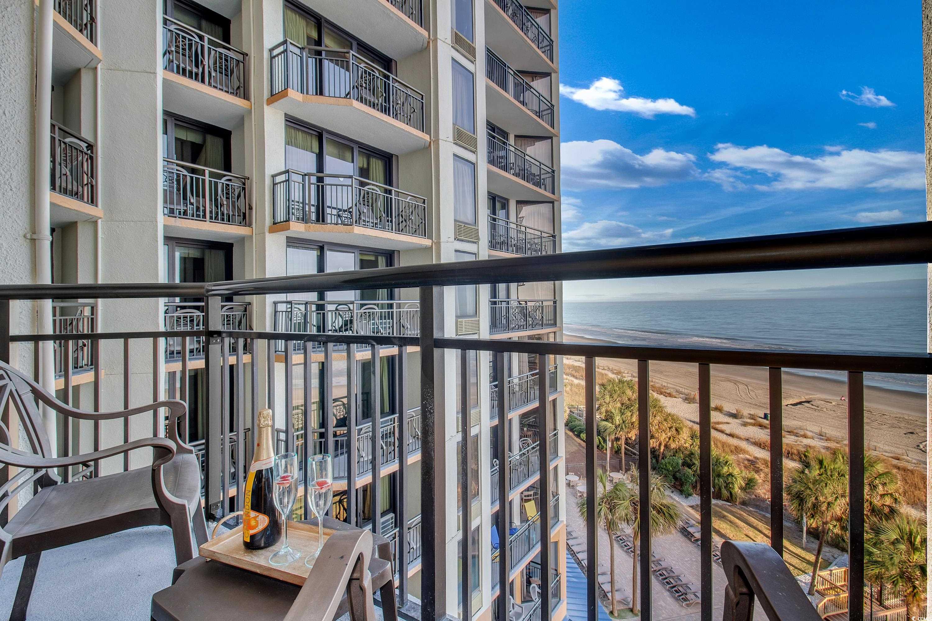 2710 North Ocean Boulevard, Unit 622 Myrtle Beach, SC 29577 - Photo 22 of 37 Balcony featuring view of water and beach