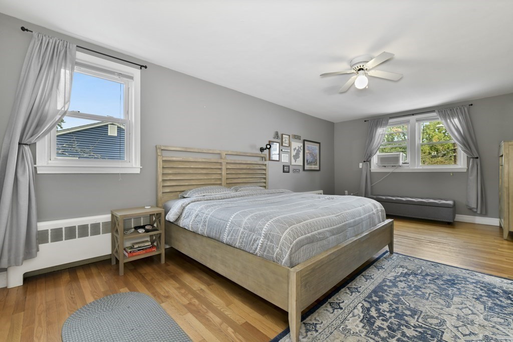 21 Stella Road Boston, MA 02131 - Photo 16 of 22 a bedroom with a bed and a window