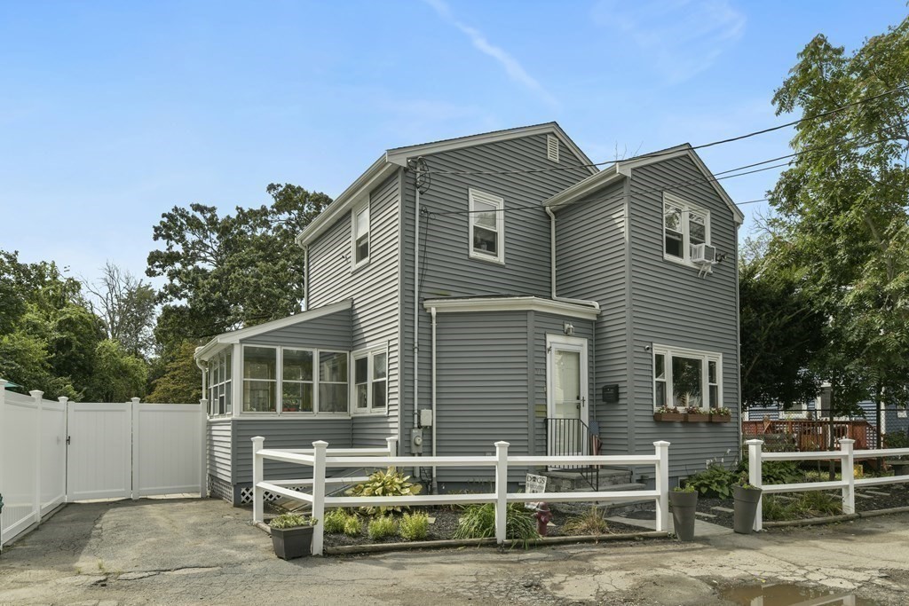21 Stella Road Boston, MA 02131 - Photo 21 of 22 a front view of a house with a yard