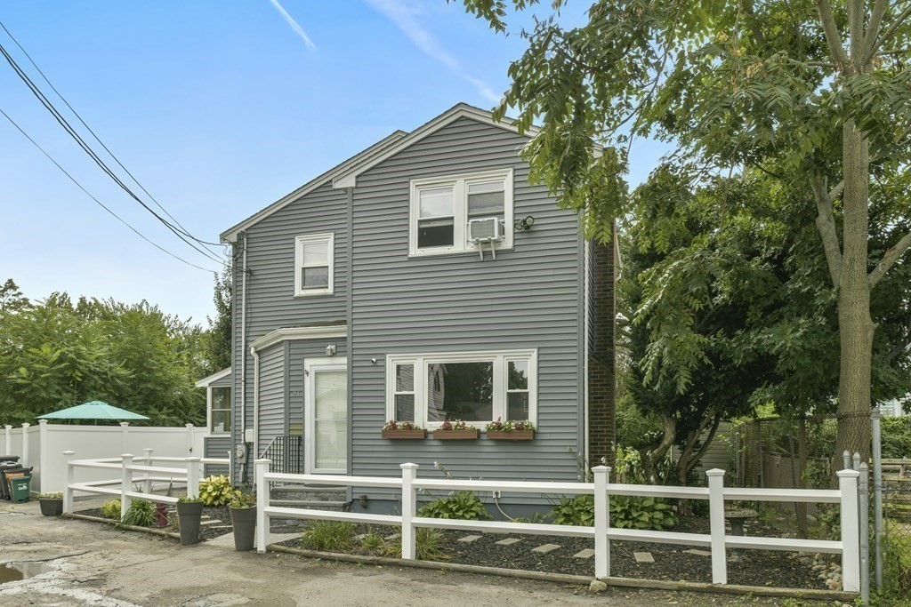 21 Stella Road Boston, MA 02131 - Photo 22 of 22 a front view of a house with plants