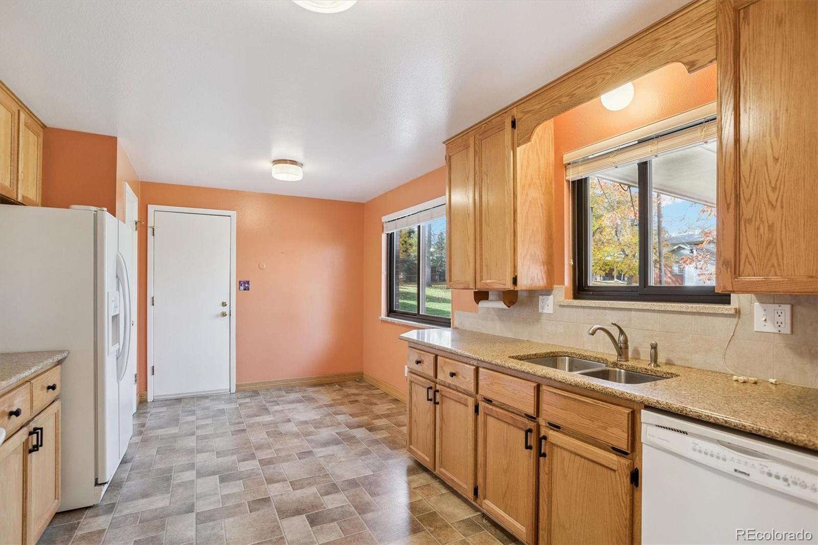 6193 South Jackson Street Centennial, CO 80121 - Photo 13 of 31 a bathroom with a sink and a mirror