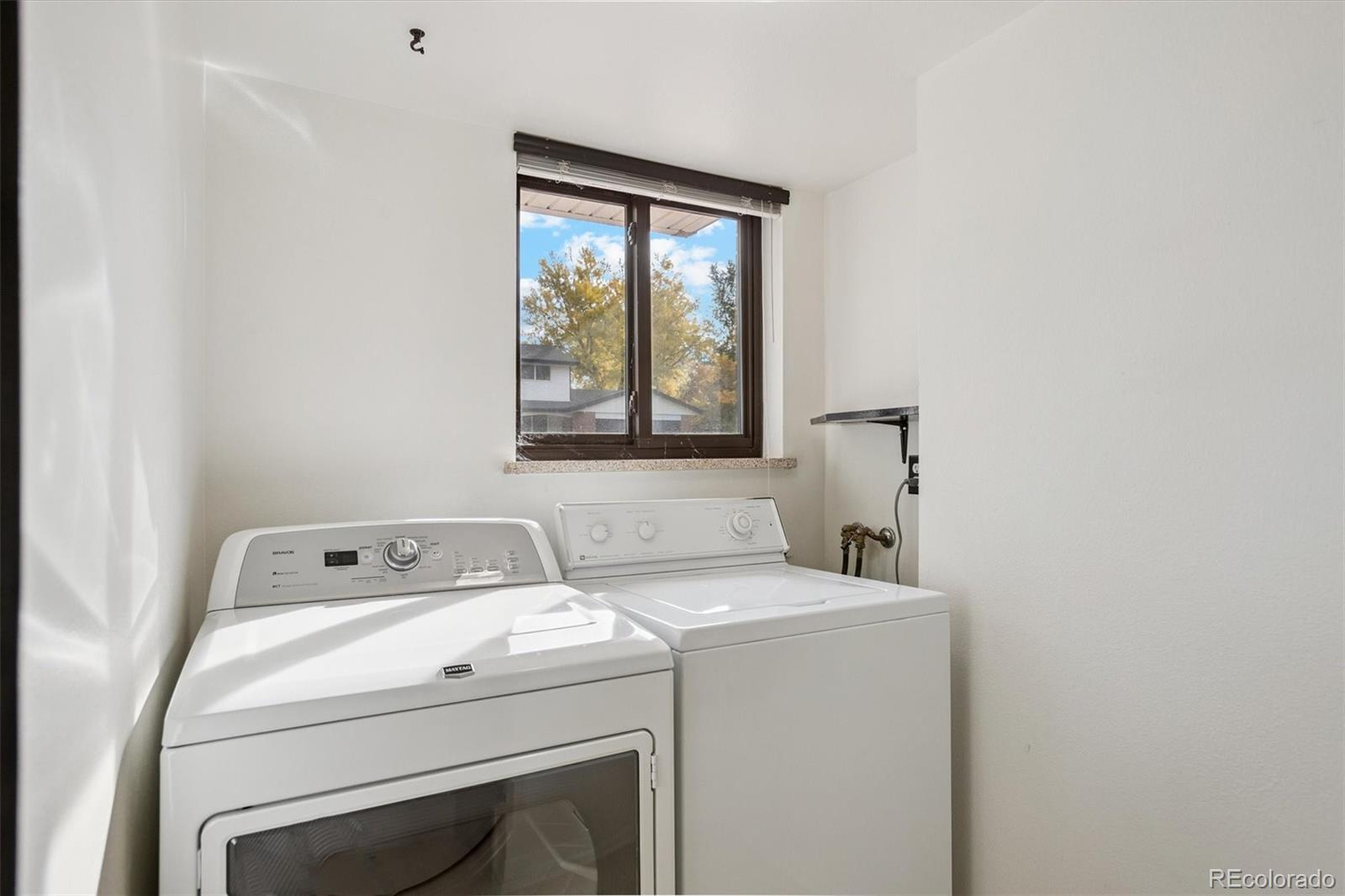 6193 South Jackson Street Centennial, CO 80121 - Photo 18 of 31 a utility room with dryer and washer