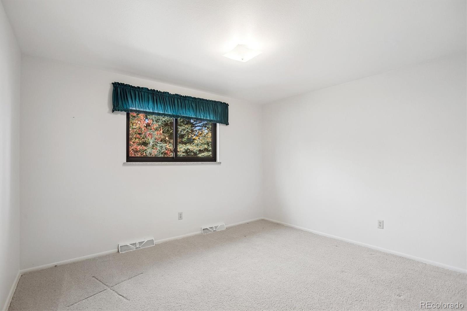 6193 South Jackson Street Centennial, CO 80121 - Photo 22 of 31 an empty room with a window