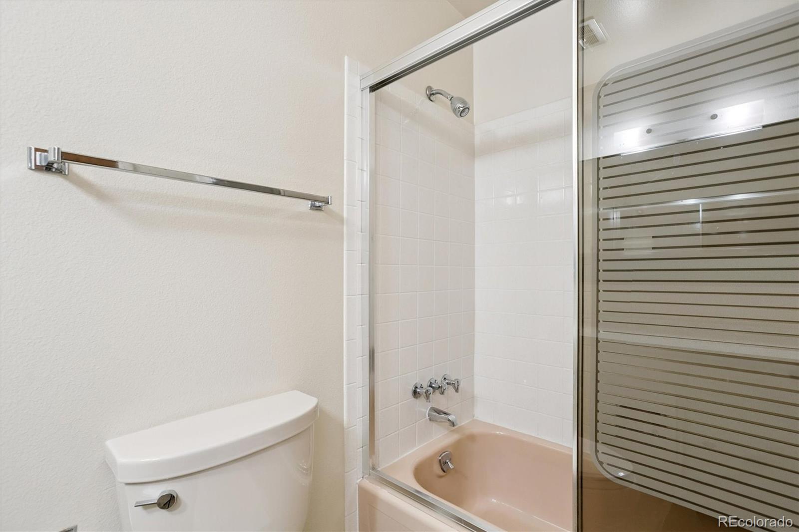 6193 South Jackson Street Centennial, CO 80121 - Photo 24 of 31 a bathroom with a sink a toilet and shower