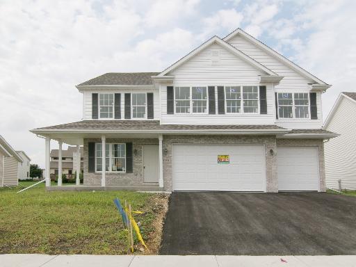 1591 Knights Lane Rochelle, IL 61068 - Photo 1 of 1 a front view of a house with a yard