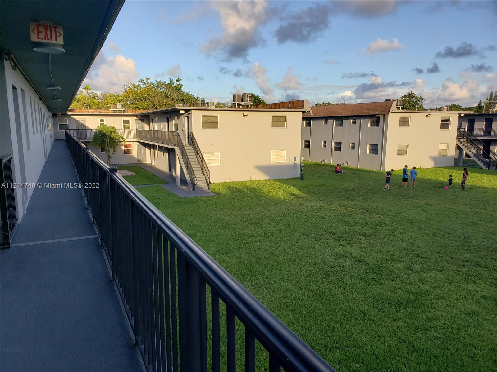 4300 Southwest 67th Avenue, Unit 30 Miami, FL 33155 - Photo 1 of 2 a view of balcony with two chairs and a table