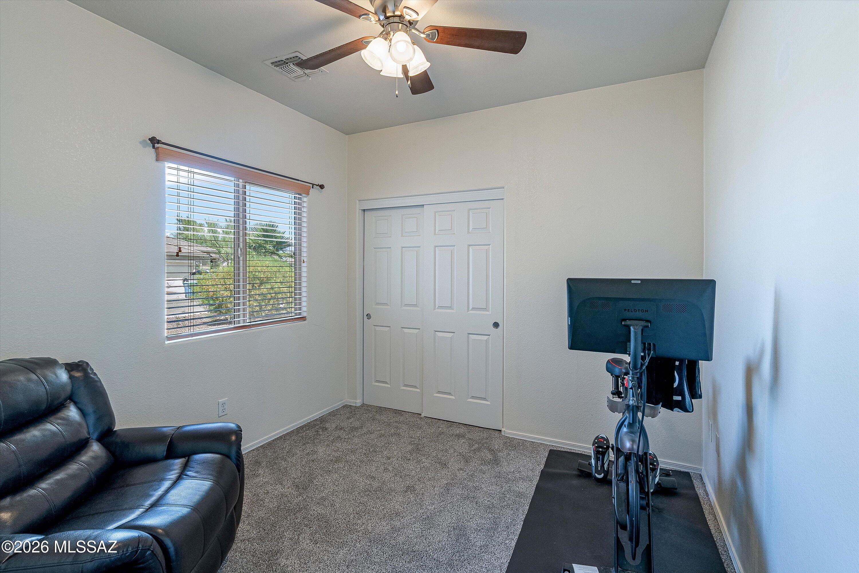 21163 East Treasure Road Red Rock, AZ 85145 - Photo 22 of 35 a living room with furniture and a window