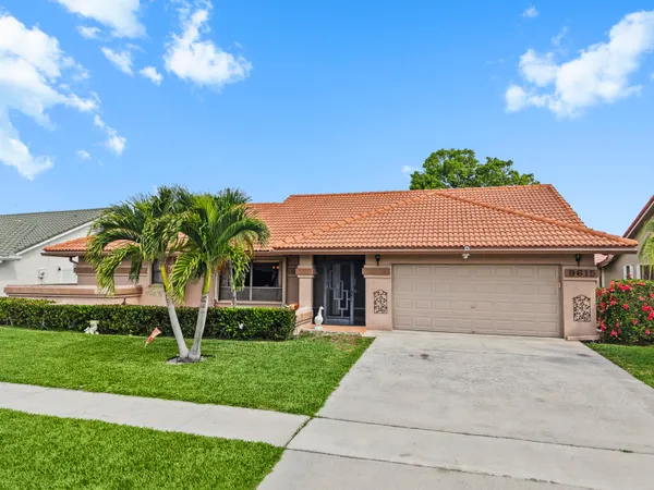 $630,000 | 9615 Sun Pointe Drive, Boynton Beach, FL 33437