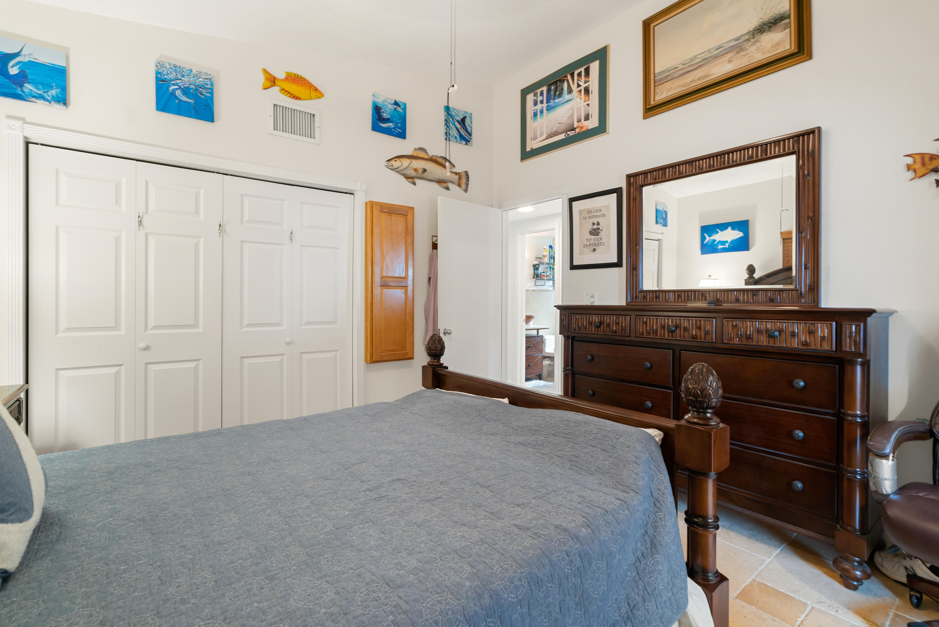 311 Buttonwood Circle Key Largo, FL 33037 - Photo 14 of 38 a living room with furniture and a flat screen tv