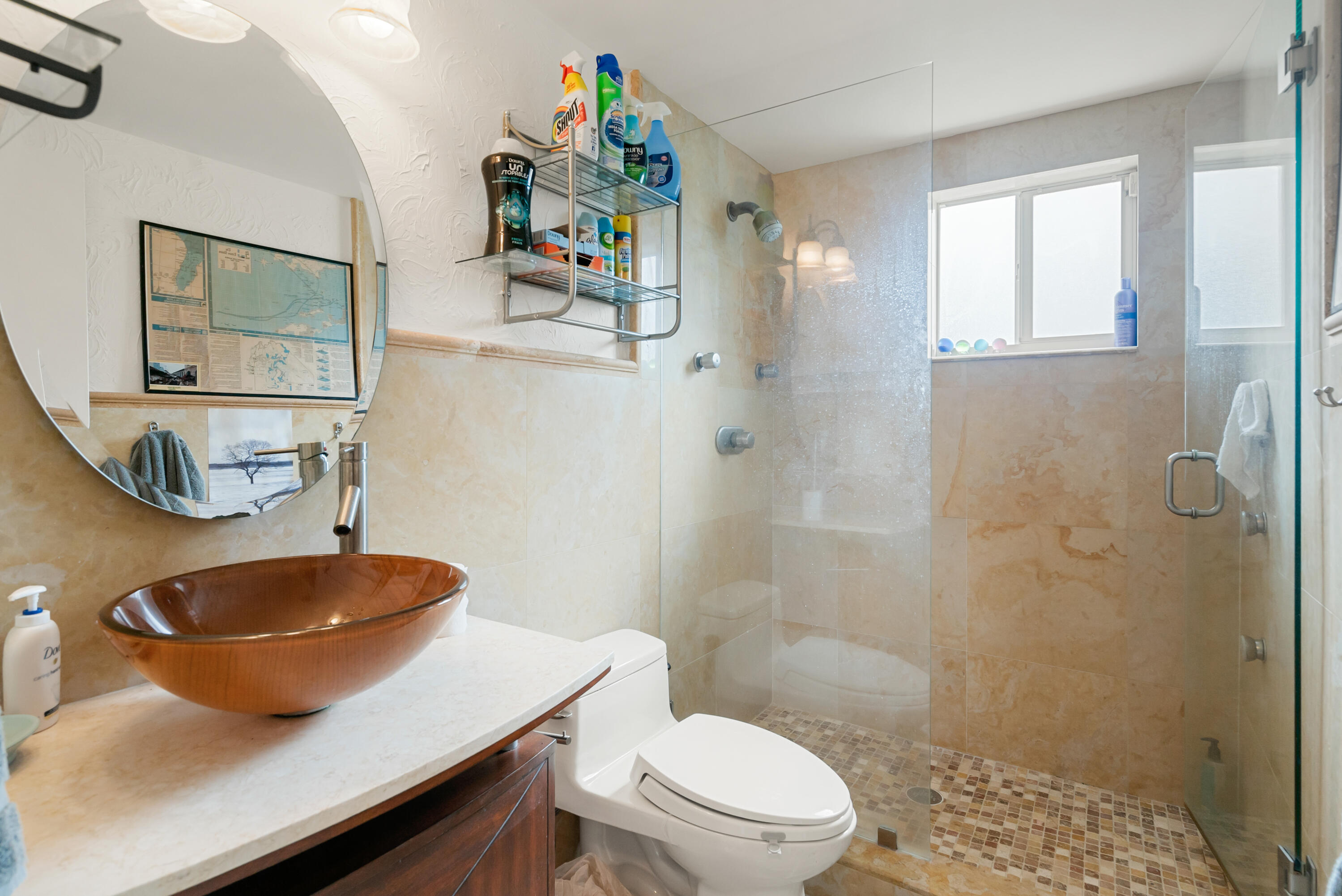 311 Buttonwood Circle Key Largo, FL 33037 - Photo 19 of 38 a bathroom with a sink a toilet and shower