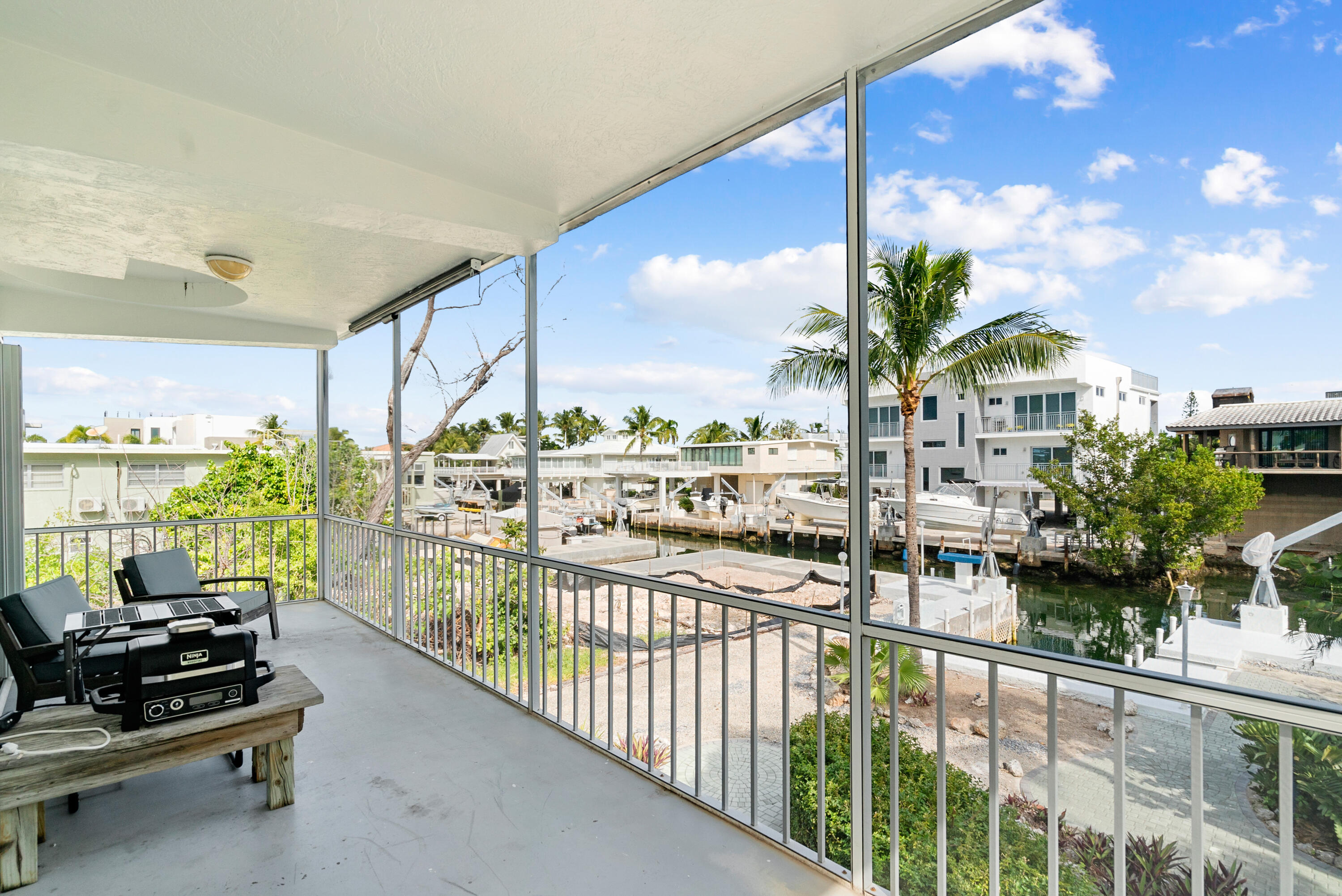 311 Buttonwood Circle Key Largo, FL 33037 - Photo 2 of 38 a view of a balcony