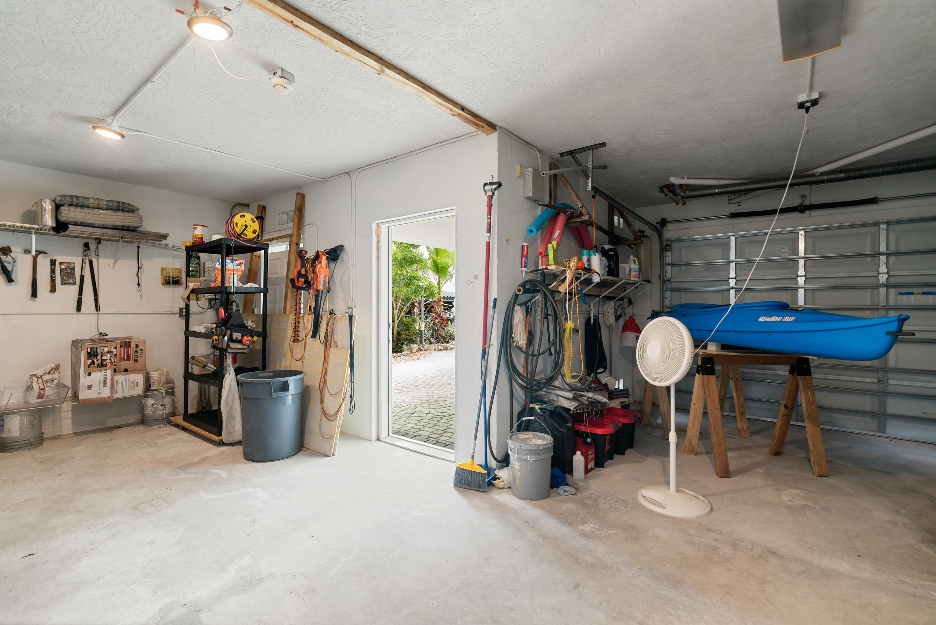 311 Buttonwood Circle Key Largo, FL 33037 - Photo 30 of 38 a view of a room with gym equipment