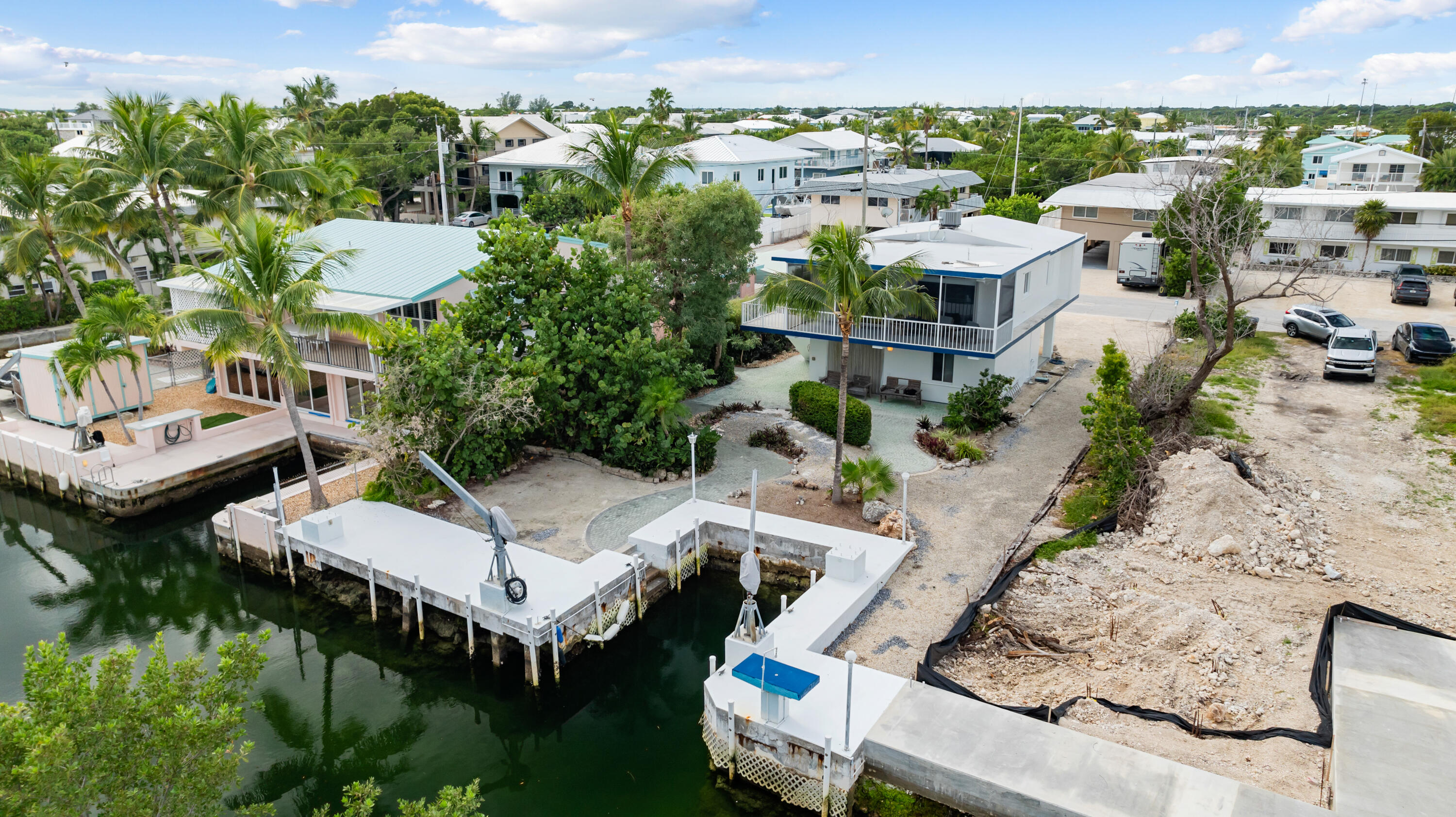 311 Buttonwood Circle Key Largo, FL 33037 - Photo 3 of 38 an aerial view of a house with a yard basket ball court and outdoor seating