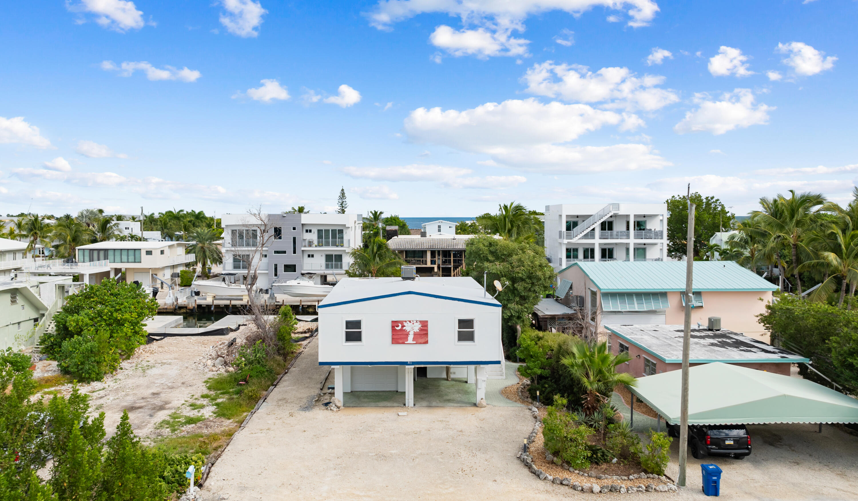 311 Buttonwood Circle Key Largo, FL 33037 - Photo 4 of 38 a picture of houses with outdoor space