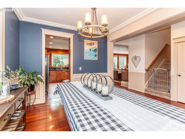 a bedroom with furniture and a chandelier