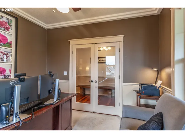 a view of a workspace with furniture