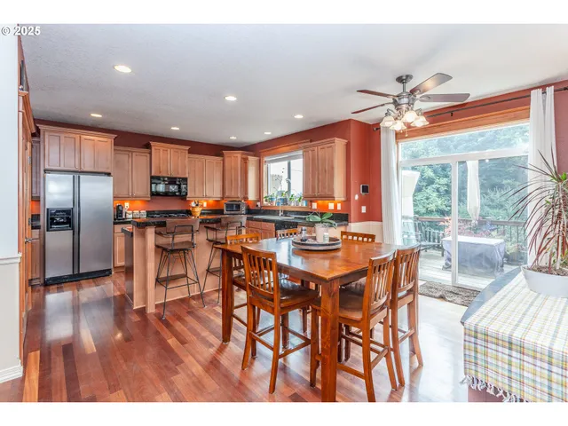 a view of a dining room with furniture window and outside view