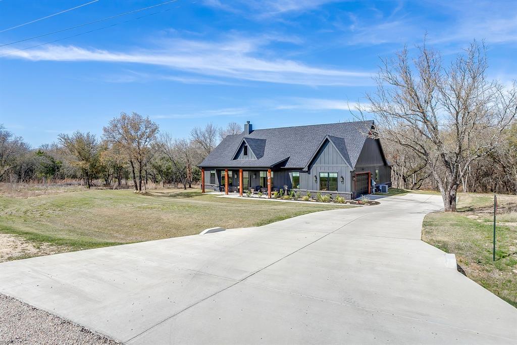 1040 Rose Court Nemo, TX 76070 - Photo 3 of 40 a view of house with yard and entertaining space