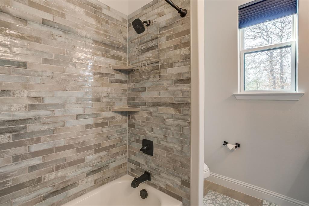 1040 Rose Court Nemo, TX 76070 - Photo 33 of 40 a bathroom with a shower