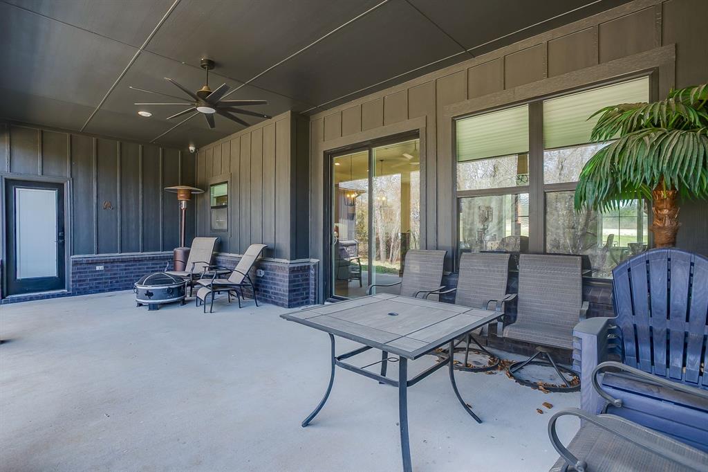 1040 Rose Court Nemo, TX 76070 - Photo 38 of 40 a living room with furniture and a large window