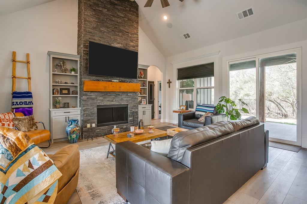 1040 Rose Court Nemo, TX 76070 - Photo 6 of 40 a living room with furniture fireplace and flat screen tv