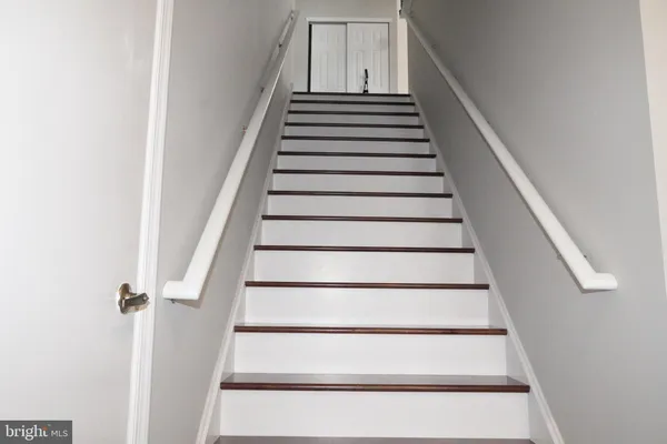 a view of entryway with wooden floor