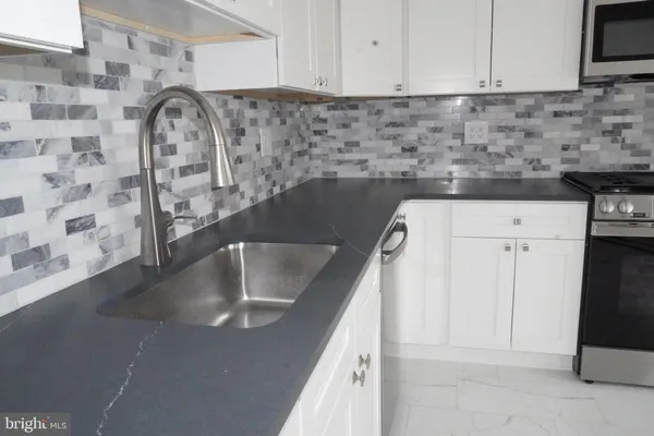 a view of a kitchen sink