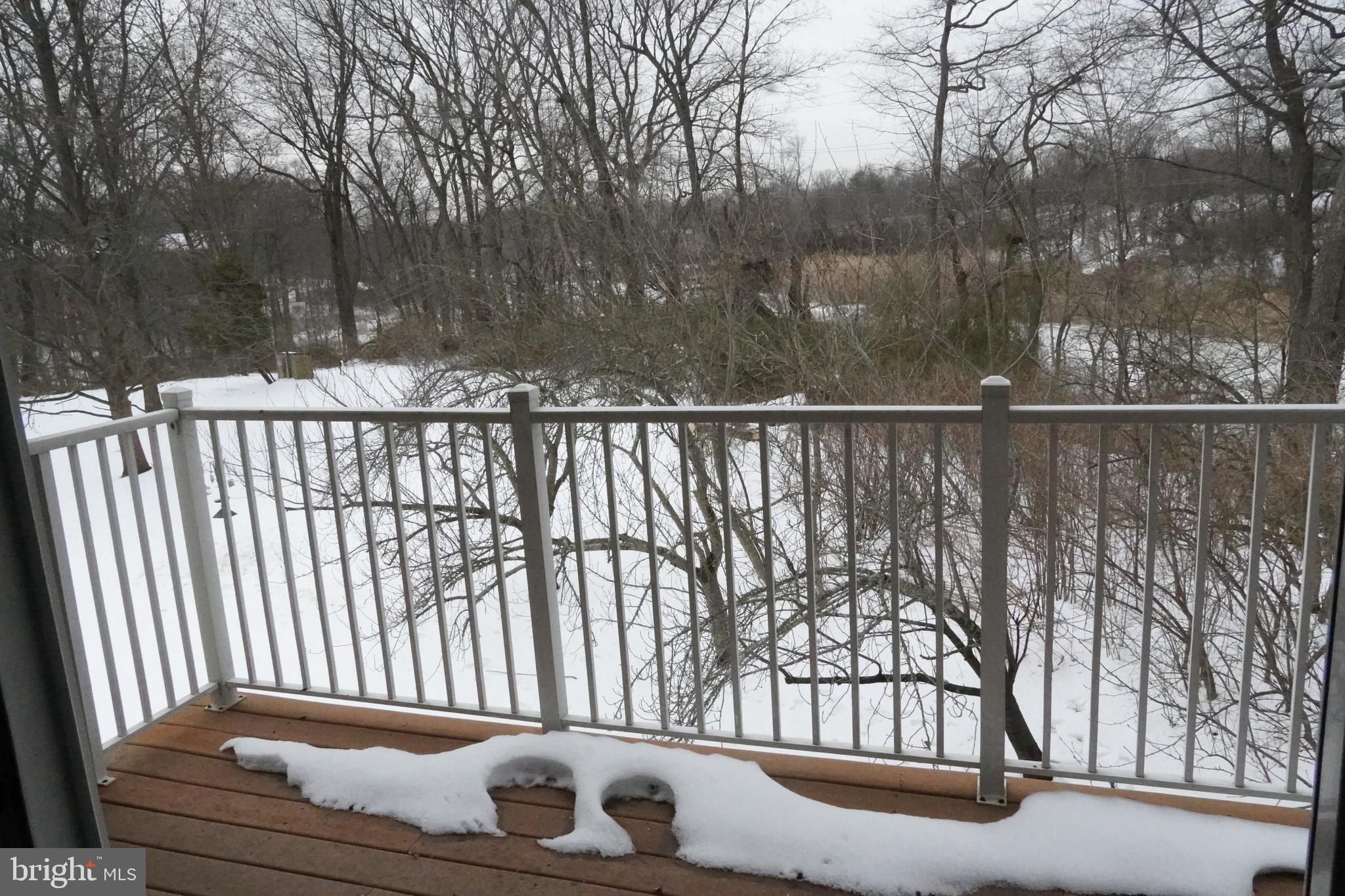 7308 B Normandy Drive Mount Laurel, NJ 08054 - Photo 9 of 23 a view of a house with backyard and trees