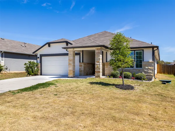 a house view with a outdoor space