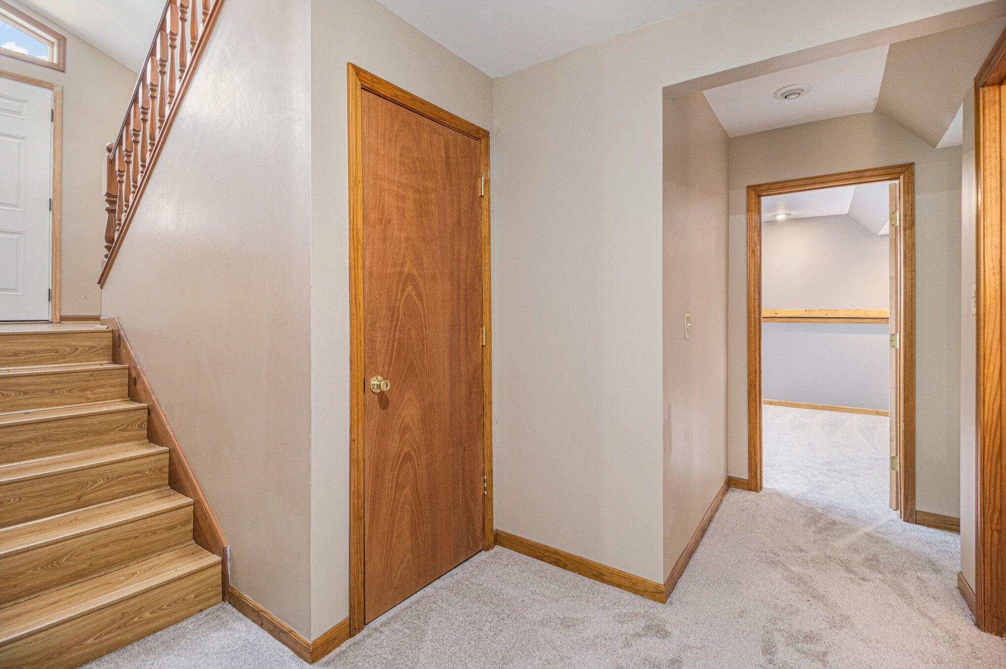 9082 Dallas Place Crown Point, IN 46307 - Photo 13 of 20 a view of a hallway with entryway