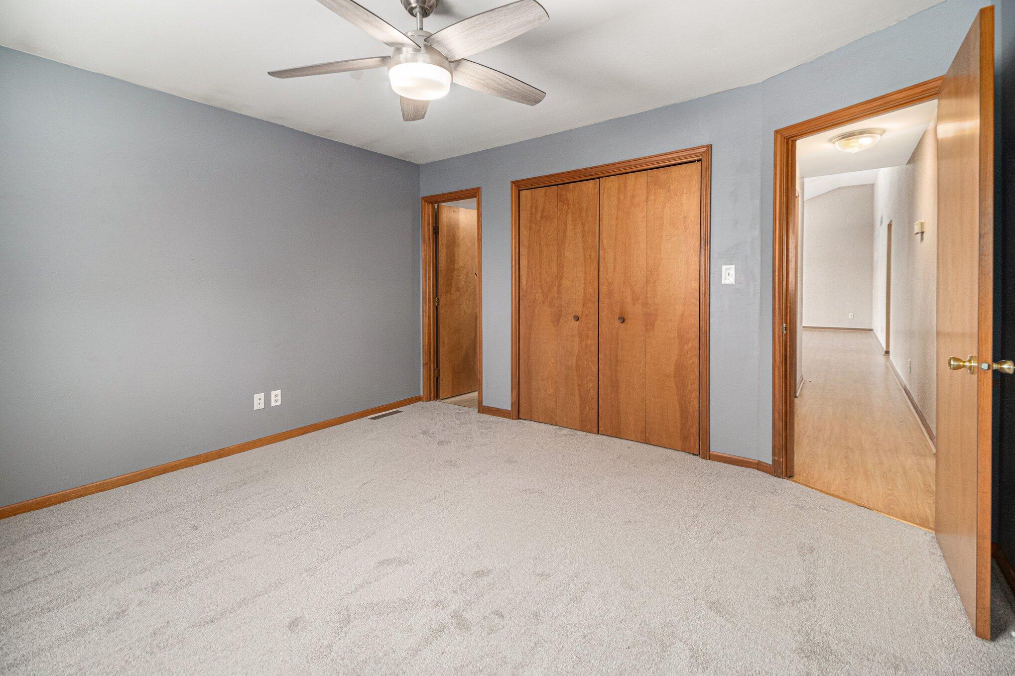 9082 Dallas Place Crown Point, IN 46307 - Photo 8 of 20 a view of an empty room and chandelier fan