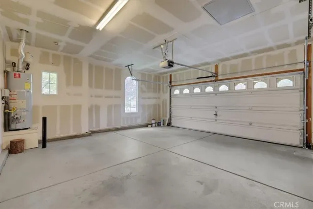 a view of an empty room and a bathroom