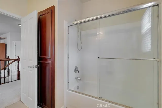 a view of an empty room with a large window