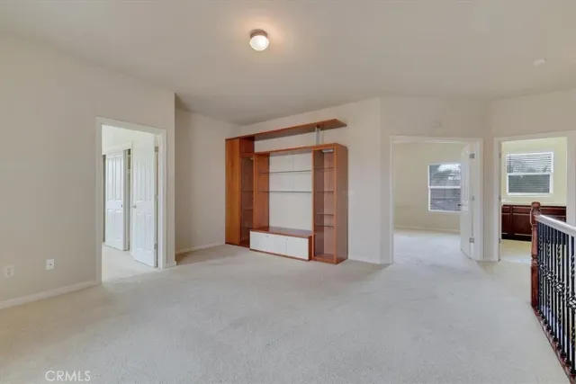 a spacious bathroom with a sink mirror and a bathtub