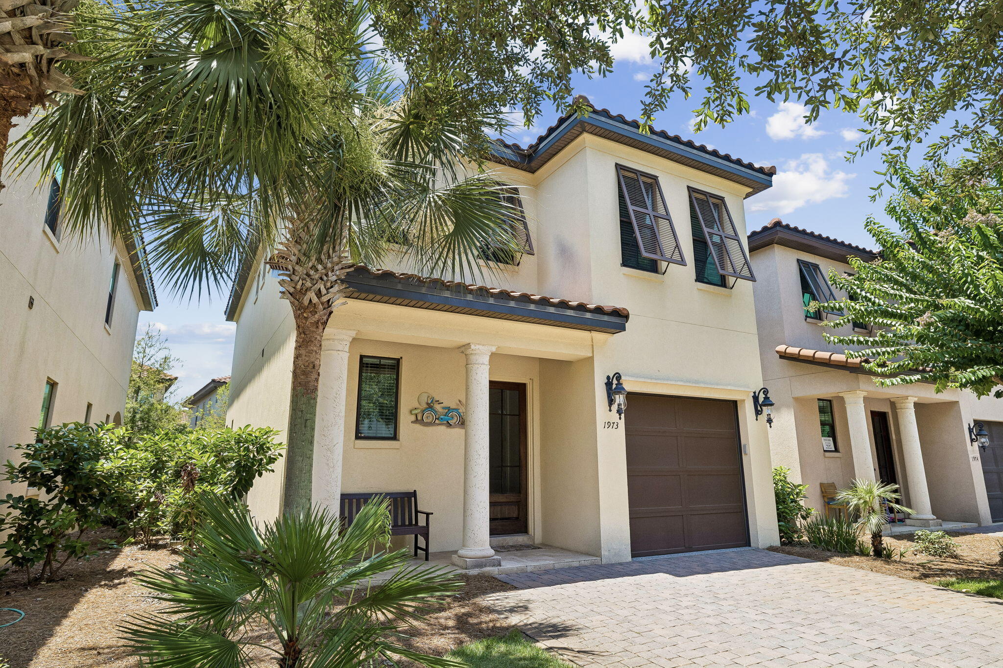 1973 Baytowne Loop Miramar Beach, FL 32550 - Photo 4 of 38 a front view of a house with a yard