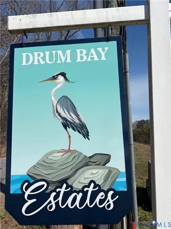 a view of a lake with boats and trees