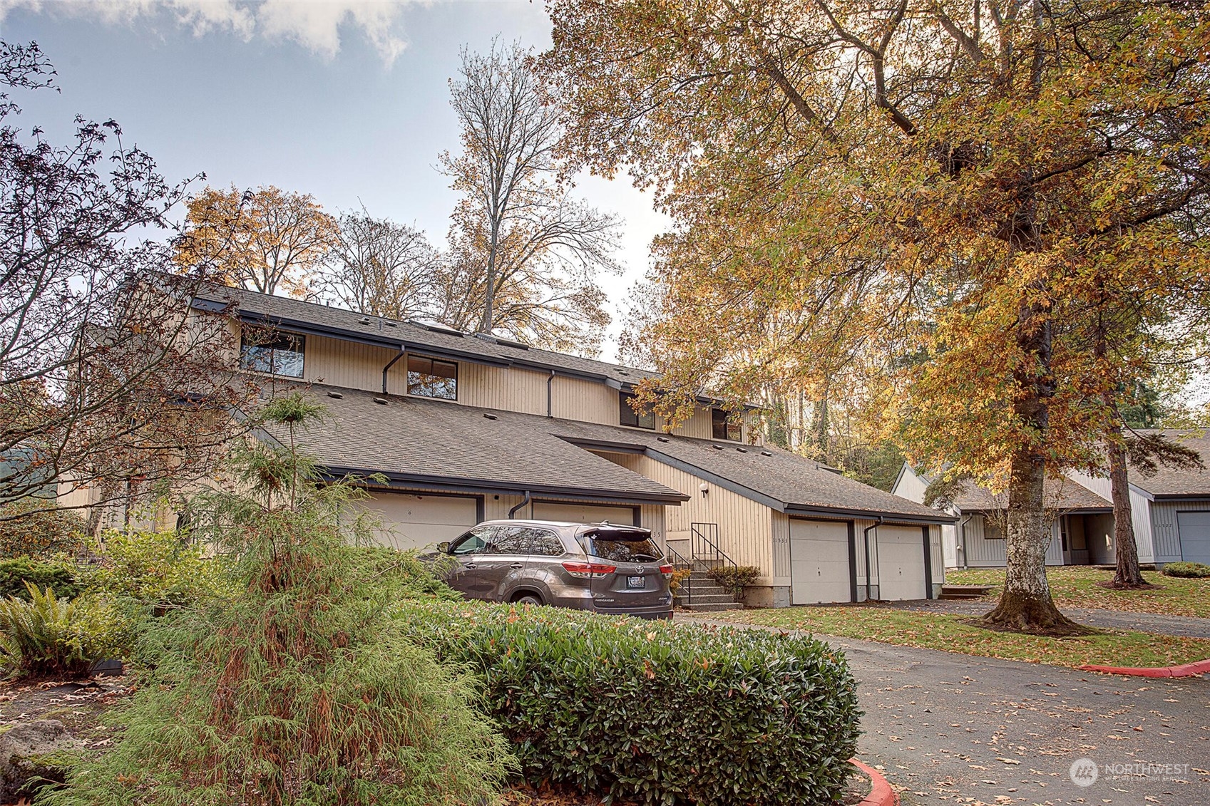 11535 Southeast 175th Street Renton, WA 98055 - Photo 1 of 40 front view of a house with a tree