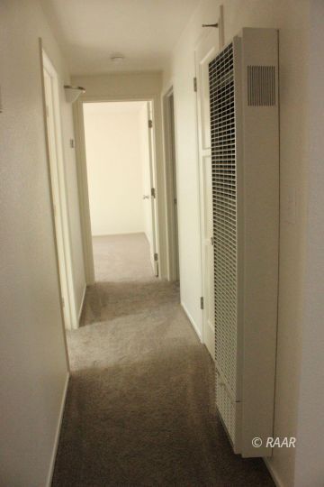325 North Norma Street Ridgecrest, CA 93555 - Photo 14 of 25 an empty room with windows