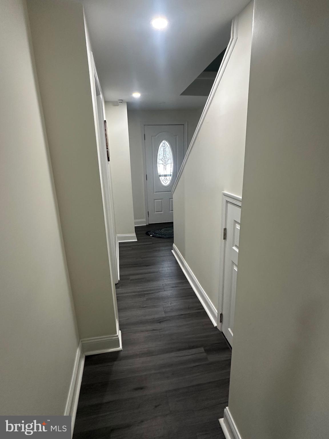 5904 K Street Capitol Heights, MD 20743 - Photo 17 of 30 a view of a hallway with wooden floor