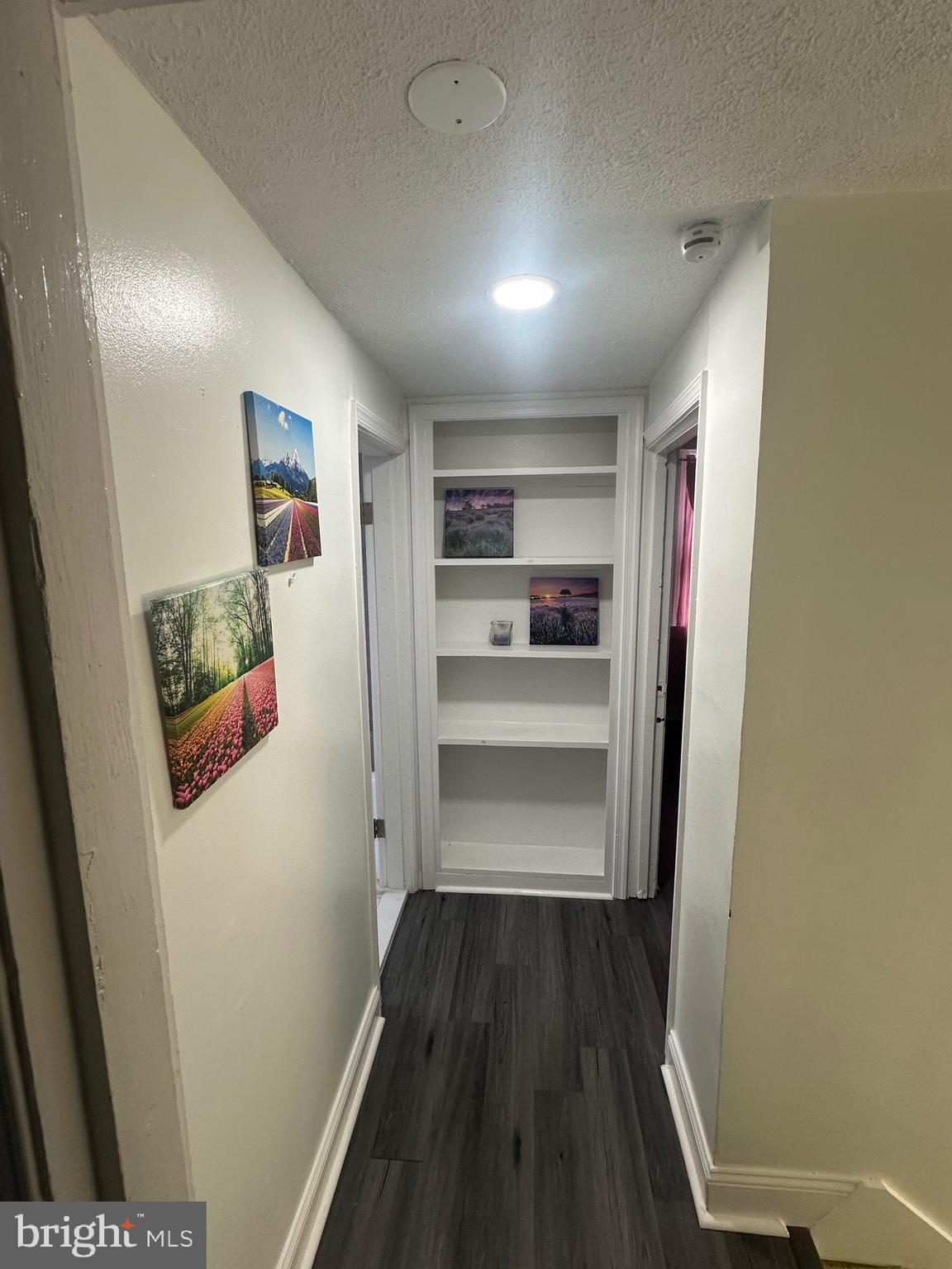 5904 K Street Capitol Heights, MD 20743 - Photo 9 of 30 a view of walk in closet with wooden floor