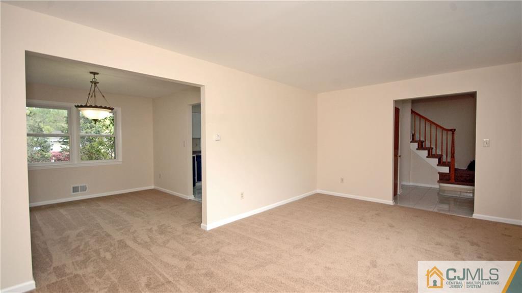 43 Brookside Road Edison, NJ 08817 - Photo 2 of 21 an empty room with windows and closet