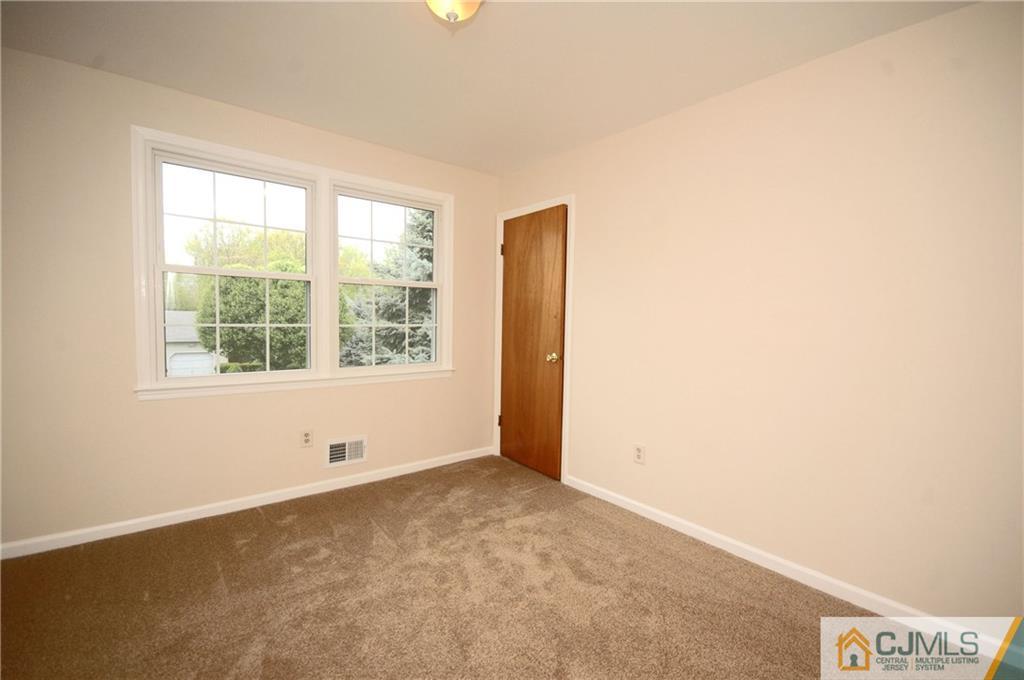 43 Brookside Road Edison, NJ 08817 - Photo 12 of 21 an empty room with windows