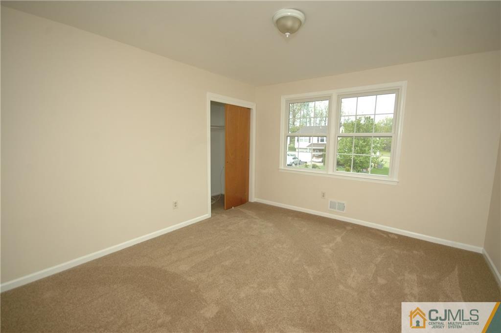43 Brookside Road Edison, NJ 08817 - Photo 13 of 21 an empty room with a window