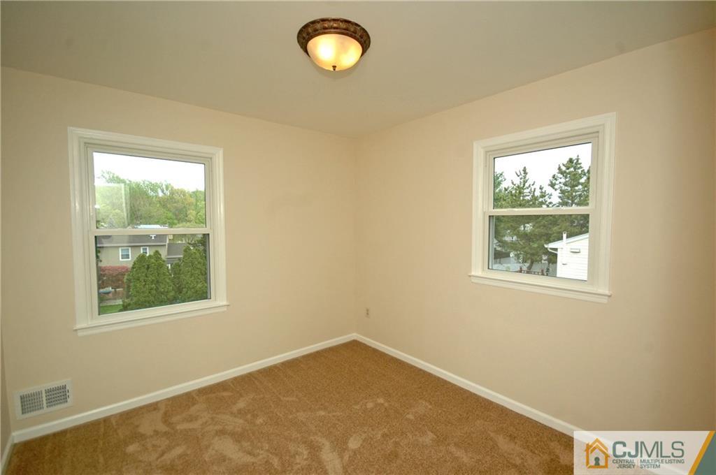 43 Brookside Road Edison, NJ 08817 - Photo 14 of 21 an empty room with windows