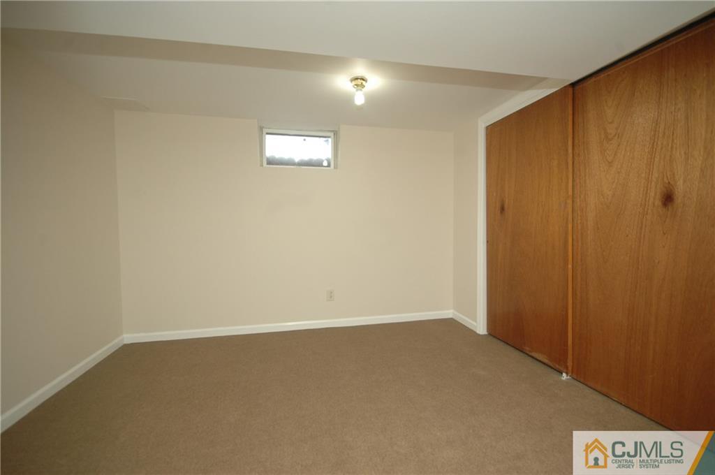 43 Brookside Road Edison, NJ 08817 - Photo 18 of 21 an empty room with windows
