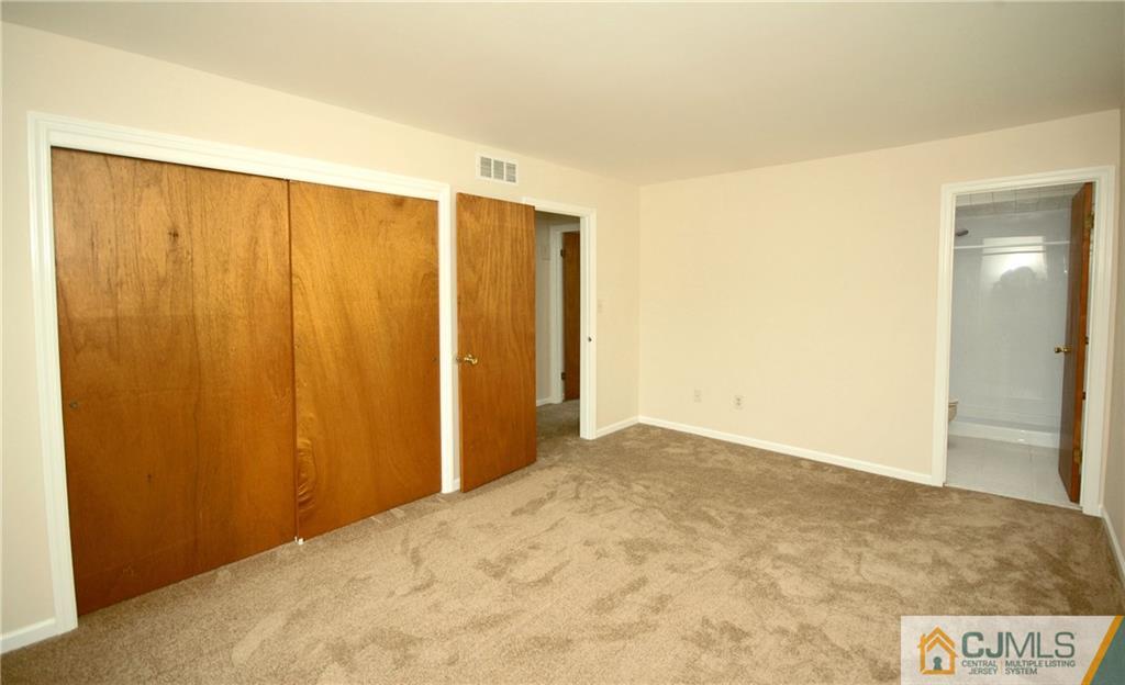 43 Brookside Road Edison, NJ 08817 - Photo 9 of 21 a view of a room with a wooden wall