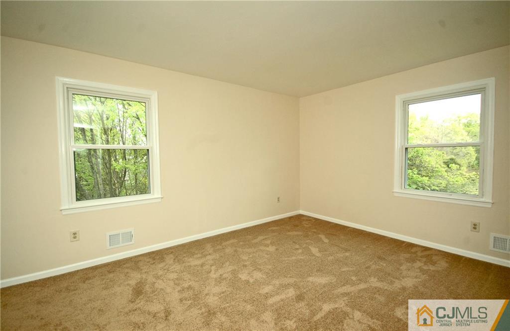 43 Brookside Road Edison, NJ 08817 - Photo 10 of 21 an empty room with a window