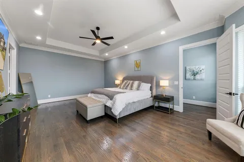 a spacious bathroom with a double vanity sink and a mirror
